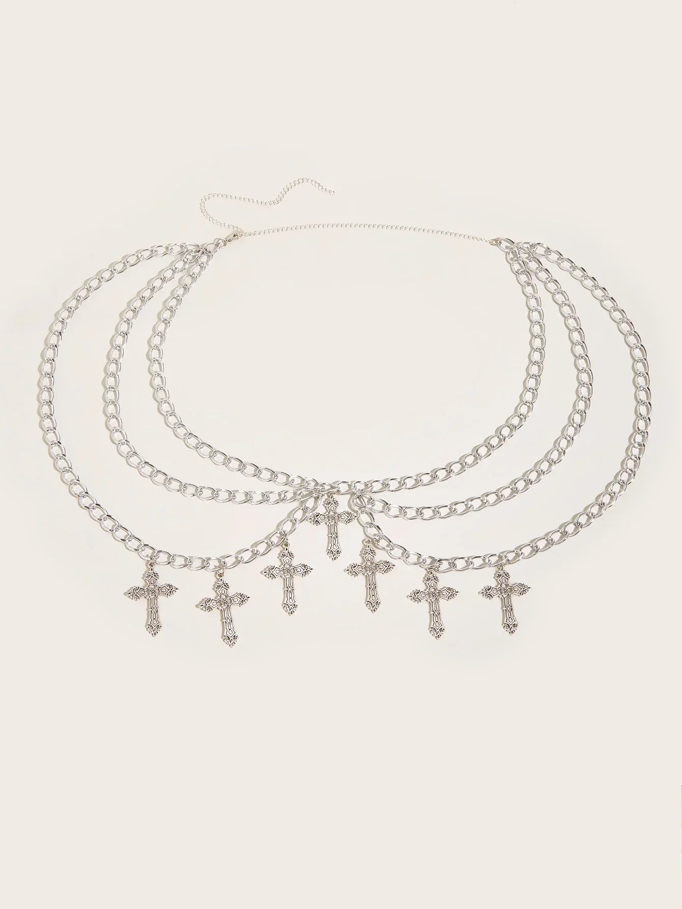 Alloy hollowed out cross pendant with wavy side swing waist chain and sexy multi-layer body chain