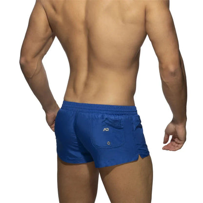New Mens Swimming Trunks Classic Solid Color Three Point Quick Drying Swimming Trunks Low Waist Sexy Beach Surfing Sports Shorts